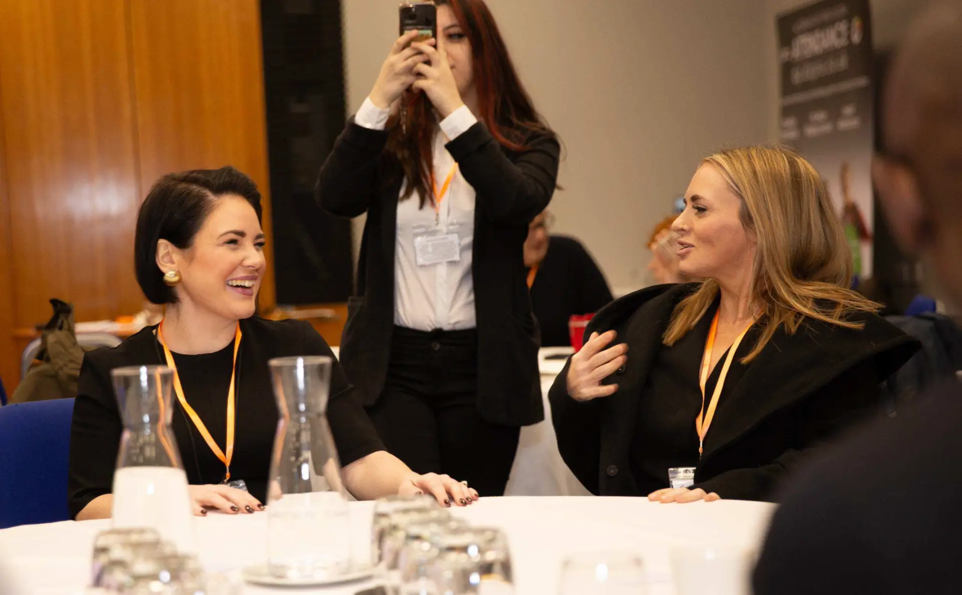 Delegates chatting at a community programme event